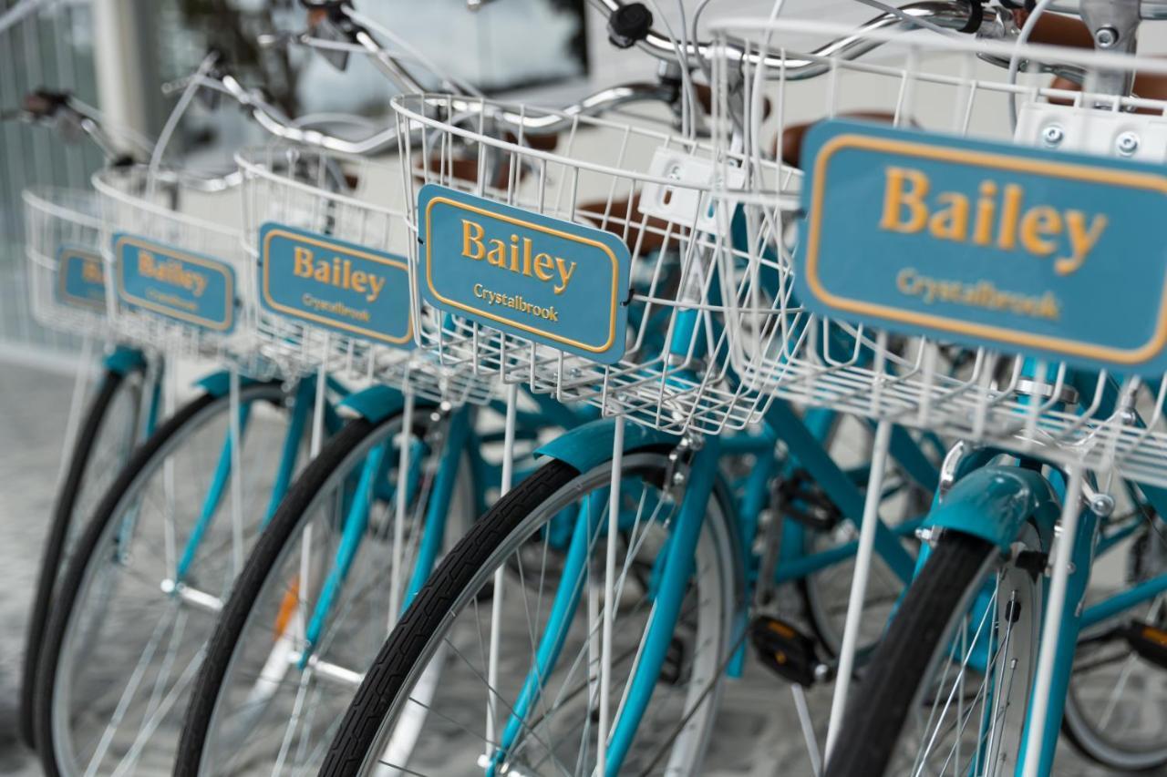 Crystalbrook Bailey Hotel Cairns Exterior foto Bicycles for hire at the station